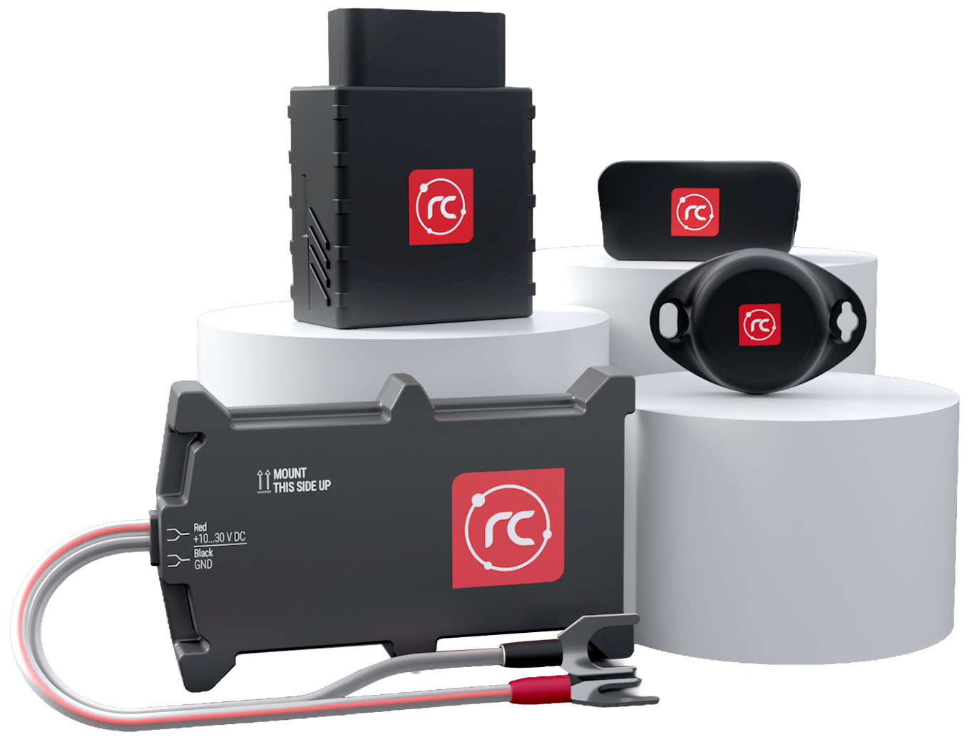 Mehere Tracking Geräte nebeneinander aufgestellt. Verdrahte, OBD und Bluetooth Track Coin Varianten.